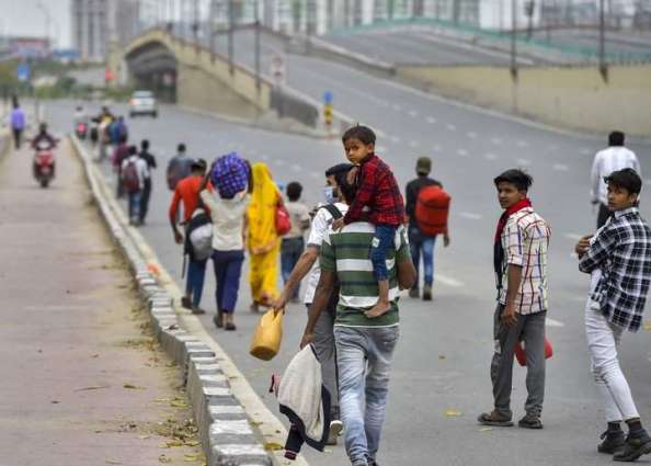Caravan of Migrant Workers Flocks Back to India's Uttar Pradesh State Ahead of Lockdown