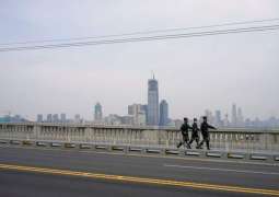 China partially seals Jilin, suspends transport links after new waves of virus