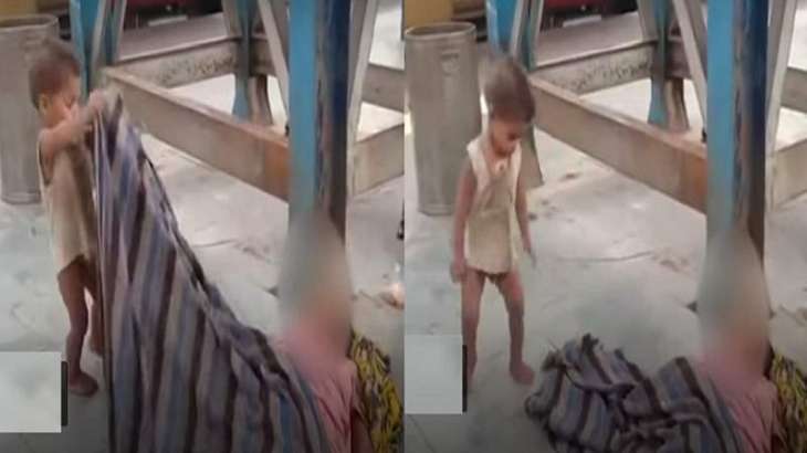 شاھد : مشھد محزن لطفل ھندي یحاول ایقاظ أمہ بعد وفاتھا متأثرة من فیروس کورونا