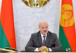 Kremlin Refuses to Comment on Lukashenko's Gun-Toting Appearance on Sunday