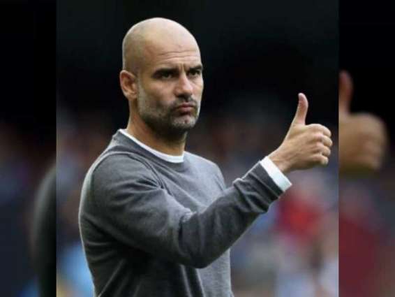 Guardiola commits to Manchester City by signing new contract to 2023