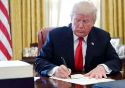 Trump Signs $1.4Trln Spending Package That Includes $900Bln in COVID-19 Relief