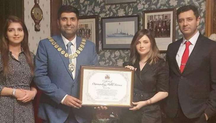 Armeena Khan receives certificate over public service in the UK
