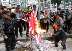 S.Korean Students Burn Japanese Imperial Flag to Protest Territorial Dispute - Reports