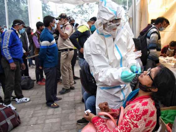 India reports 100,636 new COVID-19 infections, 2,427 deaths