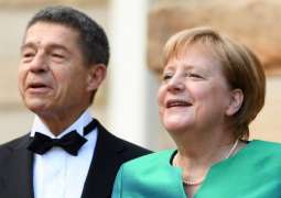 Merkel, Her Husband Invited to Dinner at White House