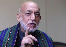 Ex-Afghan President Calls on Russia to Persist in Afghan Peace Efforts
