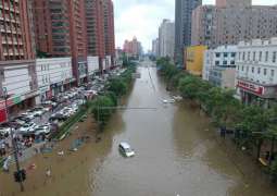 China evacuates tens of thousands as China storms spread north