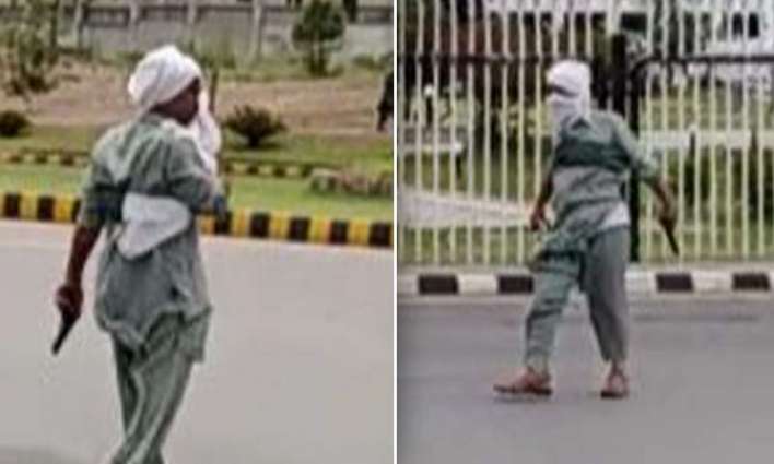 Man wielding a gun outside parliament in Islamabad arrested