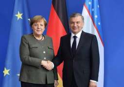 Merkel Thanks Uzbek Leader for Logistical Support of Afghan Evacuations
