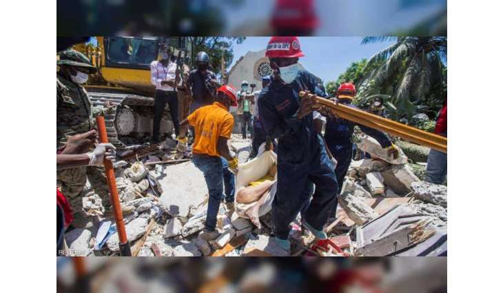 Haiti hospitals overwhelmed by quake victims as death toll hits 1,297