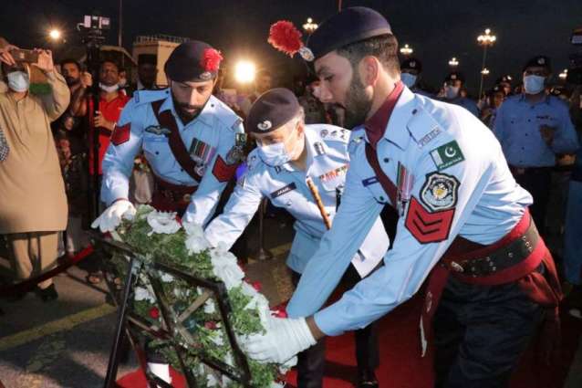 Islamabad policemen light-up candles to pay tribute to martyred colleagues