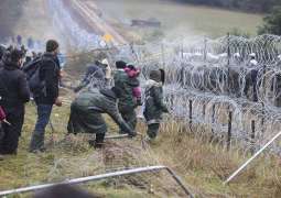 Minsk Says 4 Kurdish Refugees Beaten by Polish Security Forces Stranded at Border Camp