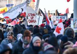 Canadian Protesters Against Vaccine Mandate Block Bridge on US-Canada Border - Police
