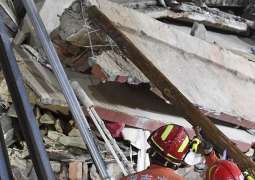 Over 20 Trapped, Almost 40 Missing in Building Collapse in China - Reports