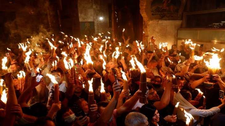 Holy Fire Descends in Jerusalem's Church of Holy Sepulcher on Orthodox Easter Eve