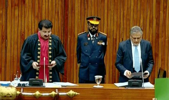 Ishaq Dar takes oath as Senator amid PTI protest