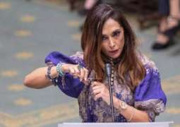شاھد مقطع : وزیر الخارجیة البلجیکیة تقص شعرھا أثناء جلسة النواب دعما للمرأة الایرانیة