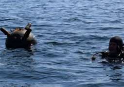Romanian Divers Neutralize Drifting Mine in Black Sea - Navy