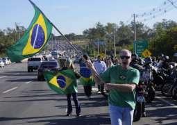 Bolsonaro Awaited by Dozens of Supporters at Brazilian Airport