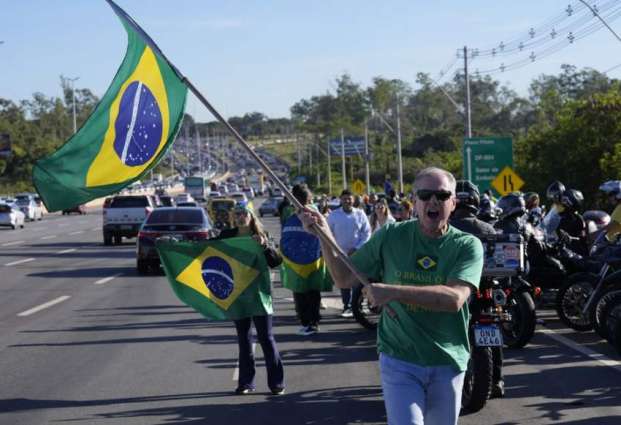Bolsonaro Awaited by Dozens of Supporters at Brazilian Airport