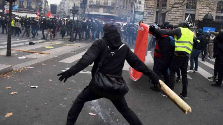 Police Now Using Tear Gas During Protest Against Pension Reform in Paris