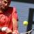 Djokovic battles into French Open second round, Alcaraz through