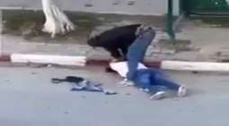 شاھد : امرأة تونسیة تتعرض للاعتداء علی ید رجل وسط شارع عام