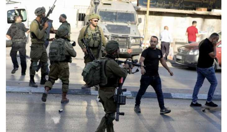 Israeli Forces Arrest Over 20 Wanted Palestinians in West Bank - IDF
