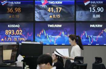 Stock markets mixed as traders eye high interest rates for longer