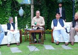 PM visits martyred Customs official's residence in Abbottabad
