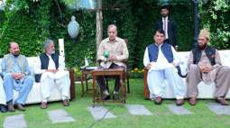 PM visits martyred Customs official's residence in Abbottabad