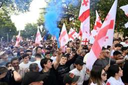Georgia ruling party stages mass rally to counter protests
