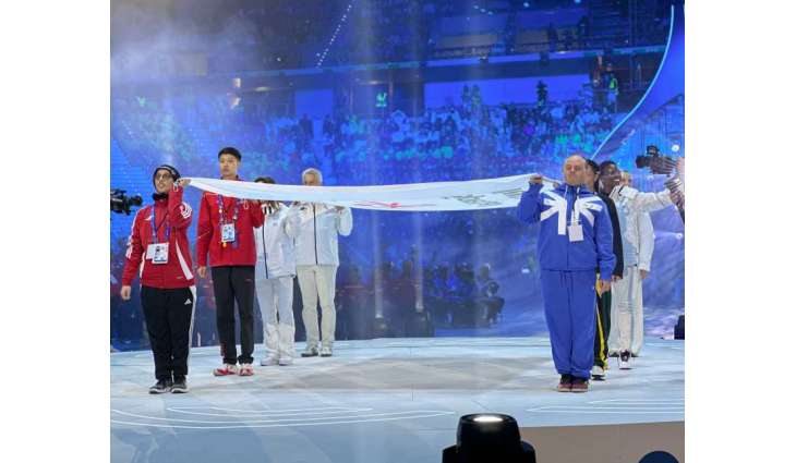Special Olympics UAE athlete Mina Al Mazrouei raises Special Olympics flag at Opening Ceremony of Turin 2025 Games