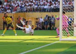 Real Madrid survive Dortmund scare to reach Club World Cup semis