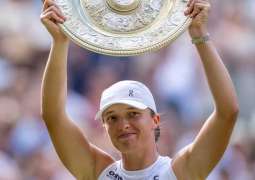 Świątek claims first Wimbledon title