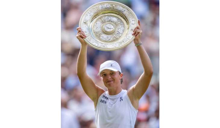 Świątek claims first Wimbledon title