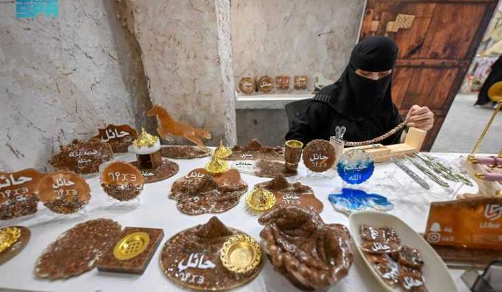 Resin Art Showcases Hail's Natural Beauty and Landmarks at Local Festival