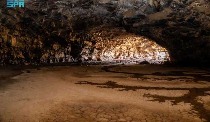 Which Cave in the Kingdom Shows Evidence of a 10,000-Year-Old Human Settlement?