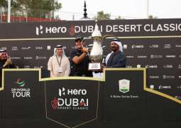 Ahmed bin Saeed presents Patrick Reed Hero Dubai Desert Classic trophy after thrilling victory