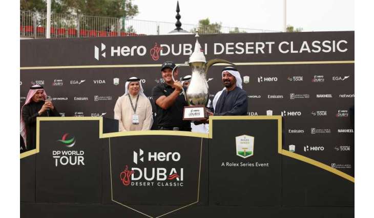 Ahmed bin Saeed presents Patrick Reed Hero Dubai Desert Classic trophy after thrilling victory