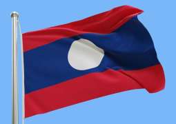 Rescuers pull four from flooded cave in Laos, two still missing