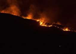 Wildfires sweep western US, Utah town evacuated