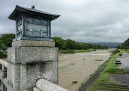 Heavy rain pounds western Japan as 2 tropical storms approach