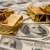 Gold prices rise amid softer US dollar, lower oil prices