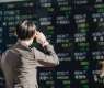 Japan’s Nikkei slumps, yen trades above 160 per dollar