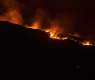 Wildfires sweep western US, Utah town evacuated