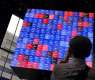 Japan’s Nikkei stock average extends fall on Fed rate-hike