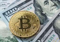 Dollar rises against major currencies, cryptocurrencies decline