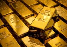 Gold drops by about 3%
